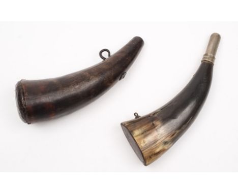 An early 19th century powder horn:, of plain form with single iron suspension and wooden bung, 19cm long, together with a lat