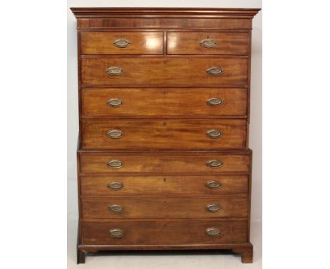 A GEORGE III MAHOGANY CHEST-ON-CHEST, the moulded pediment above a banded frieze, the upper-section with two short and three 