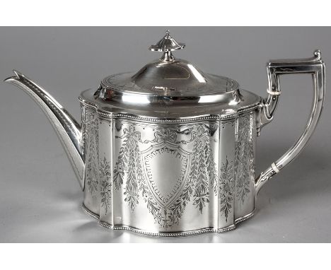 A LATE VICTORIAN SILVER TEAPOT, SHEFFIELD 1892, MARTIN HALL & CO., hinged top with removable finial, oval body engraved with 