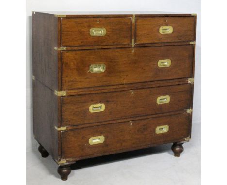 A 19th CENTURY ENGLISH TEAK MILITARY CHEST, the top and sides bound with brass corners and strapping, with two short drawers 