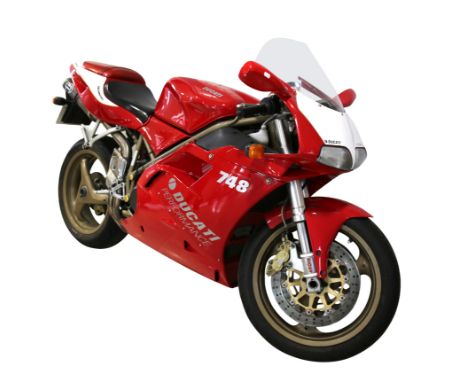 A DUCATI 748 SPORTS BIKERegistration Number: W818 PT0'Few motorcycles match the simple, gorgeous curves of the Ducati 748' MC