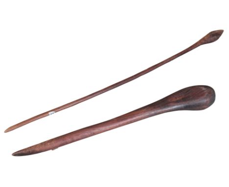 AN ABORIGINAL THROWING CLUBAustralia, probably Arnhem Land, 20th century, with weighted end for hunting waterfowl, 56.5cm lon