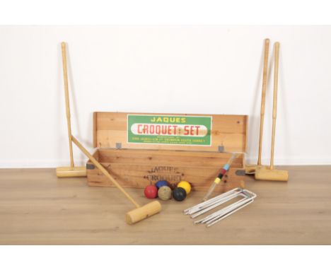 A CROQUET SET BY 'JOHN JAQUES & SON, THORTON HEATH, SURREY'in pine crate with complete contents and instructions, 19cm high x