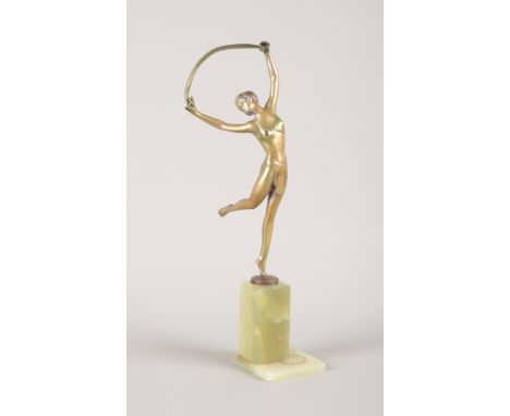 AN ART DECO STYLE EXOTIC 'SCARF DANCER' BRONZE FIGURE AFTER JOSEF LORENZLthe cold painted bronze balanced on one foot, signed