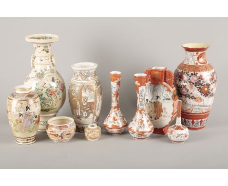 A JAPANESE SATSUMA POTTERY VASEearly 20th Century, with twin ring handles, enamelled with crane, insects and foliage on an of