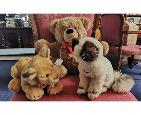 Steiff Teddy 'Bobby', plush caramel fur with red bow and Steiff tags, together with Steiff 'Baby Leo', with button in ear and