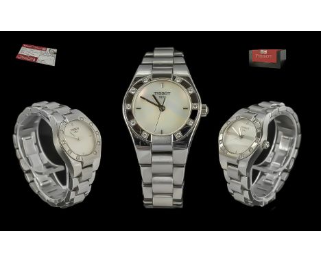 Ladies Tissot Watch. In Excellent Condition. Features Silver Face and Bracelet, With White Flourscent Face, Silver Tone Strap