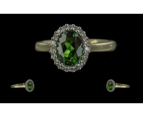 Ladies - Attractive 9ct Gold Diamond and Gem Set Cluster Ring. Full Hallmark to Shank. The Central Faceted Green Stone of Exc