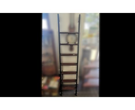 Mahogany Library Ladder, seven rungs, measures 75" tall.  Lovely decorative and useful piece.
