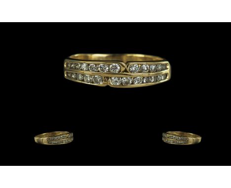 18ct Yellow Gold - Pleasing Quality Double Channel Diamond Set Dress Ring. The Brilliant Cut Round Diamonds of Excellent Colo