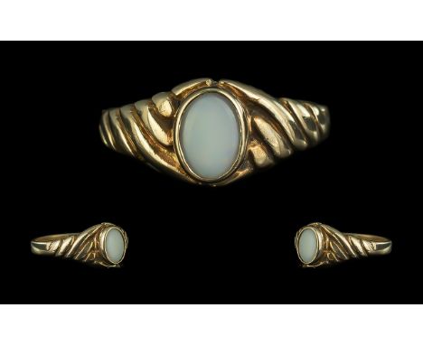 Attractive Opal Set Ring in a 9ct gold, twist style band; the opal of good colour, the band fully hallmarked; ring size O, 2.