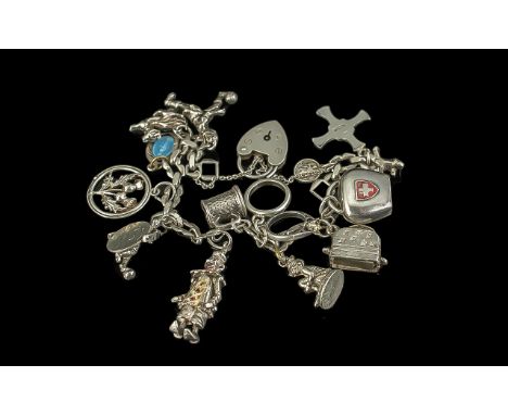 Silver Charm Bracelet. Various Charms Including Footballer, Diamond Ring, Clown, Tankard etc. Weight Approx 44 grams. 