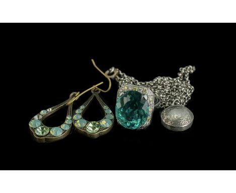 Small Collection of Costume Jewellery, comprising a silver dress ring set with a large semi-precious teal clear stone, size M