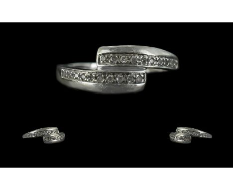 Contemporary Ladies Diamond Ring Set In 9ct White Gold. Contemporary Design, Set with Channel Set Diamonds In White Gold. Ful