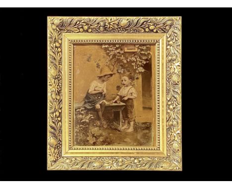 A Crystoleum Picture housed in a later gilt frame. Depicts two children in back yard playing. Measures 14.5 by 12 inches. 