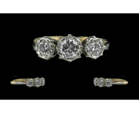 Ladies 18ct Gold and Platinum Attractive 3 Stone Diamond Set Ring. Marked 18ct and Platinum to Shank. The Round Faceted Diamo