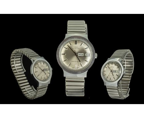 A Vintage Timex Automatic Wristwatch, water resistant, base metal bezel, stainless steel back. Water resistant, white metal s