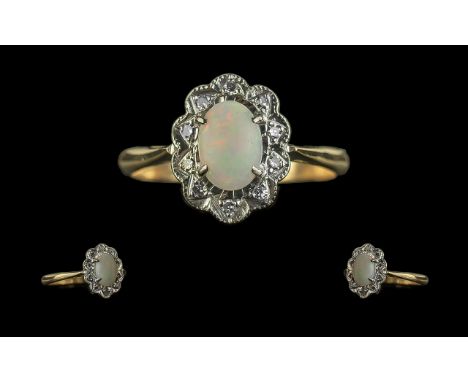 18ct Ladies Opal and Diamond Ring. An Opal Ring Surrounded by Diamonds In 18ct and Platinum. Antique Period. Marked 18ct to S