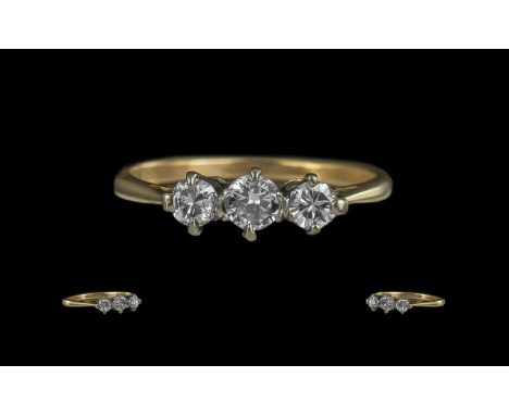 18ct Gold - Pleasing 3 Stone Diamond Set Ring. Marked 18ct to Shank. The 3 Diamonds of Good Colour and Clarity. Weight 1.9 gr