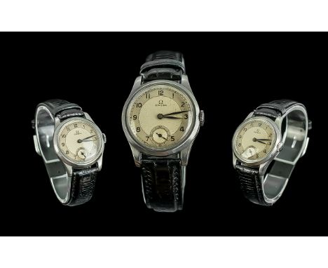 Gents Omega Wristwatch, Silvered Chapter Dial, Arabic Numerals With Subsidiary Seconds, 30mm Stainless steal case, Manual Win