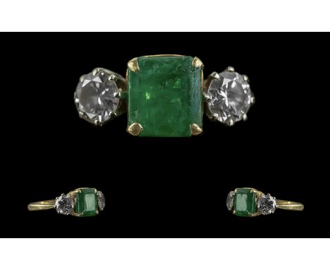 Ladies 18ct Gold Attractive 3 Stone Emerald and Diamond Set Dress Ring. Marked 18ct to Shank. The Central Step-cut Emeralds a