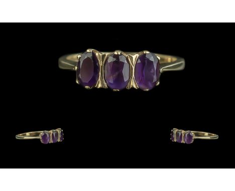 9ct Gold Amethyst 3 Stone Ring. Amethyst Set Ladies Ring In 9ct Yellow Gold, Good Design and Quality Throughout. Ring Size R.