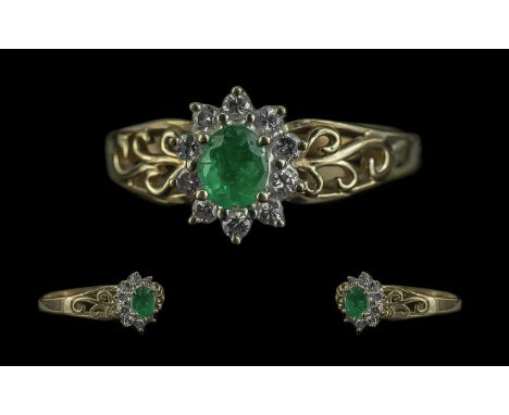 Ladies 9ct Gold Attractive Emerald and Diamond Set Ring. Full Hallmark to Shank. The Central Faceted Emerald of Good Colour, 