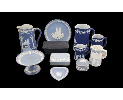 Collection of Wedgwood, comprising three matching Wedgwood Jasper dark blue jugs measuring 7.5", 5" and 4" high, a Jasper mid