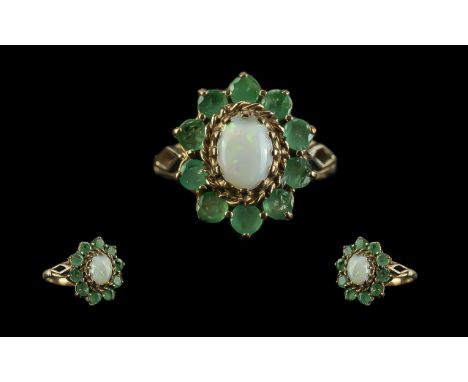 Ladies Pleasing 9ct Gold Emerald &amp; Opal Cluster Ring, full hallmark to shank.  The central Opal surrounded by 10 faceted 