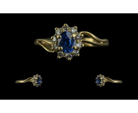 Ladies 18ct Gold - Good Quality Petite Tanzanite and Diamond Set Cluster Ring. Marked 18ct to Shank. The Tanzanite of Excelle