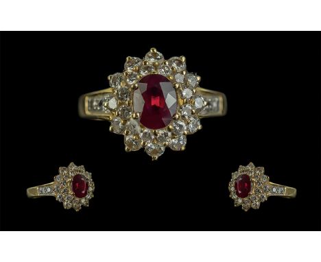 18ct Gold - Good Quality Ruby and Diamond Set Ring, Flower head Design. Marked 750 to Interior of Shank. The Central Faceted 