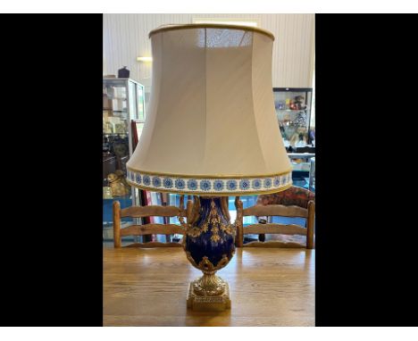 Blue &amp; Gilt Table Lamp with decorative swan handles and leaf design.  Square base, measures approx. 22" high.  With quali