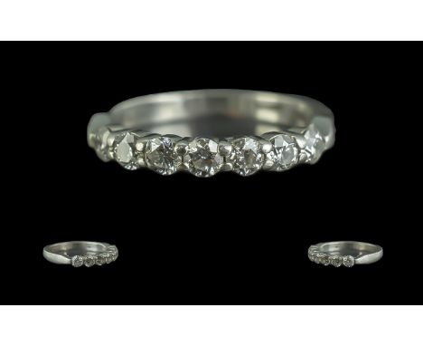 Platinum Superb Quality 7 Stone Diamond Set Ring. Marked Platinum 950 to Interior of Shank. The Round Brilliant Cut Diamonds 
