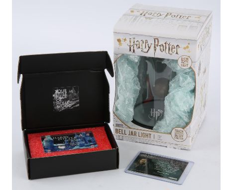 Harry Potter Prop Swatch and Ephemera Various Harry Potter items, to include; Golden Snitch Bell Jar Lamp by Wizarding World 