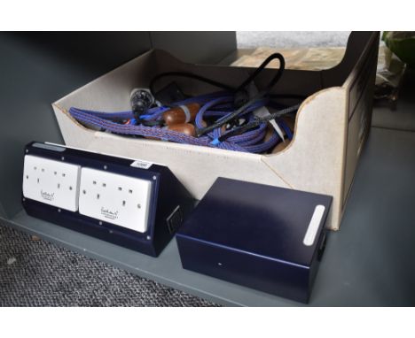 A box of top of the range stereo speakers connections and speaker cable - this lot includes the Russ Andrews socket bank and 