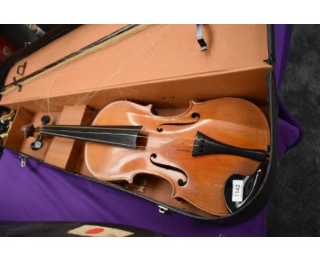 A traditional viola in vintage card case, bow stamped japan