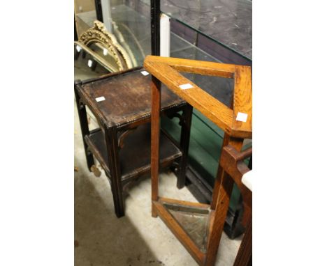 An oak two tier table and a stick stand.