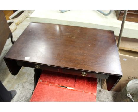 A reproduction mahogany sofa table.