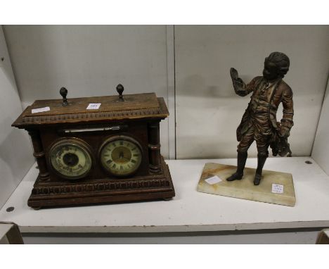 A combination clock, barometer and thermometer together with a cast metal figure of a musician.