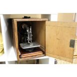 A Willcox & Gibbs cased sewing machine.