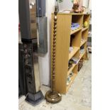 An oak barley twist standard lamp.