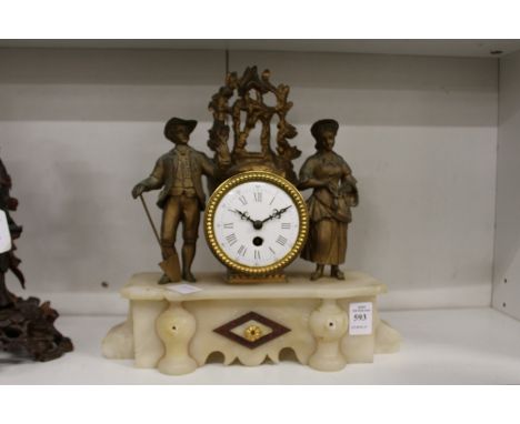 A French gilt metal and alabaster mantle clock.