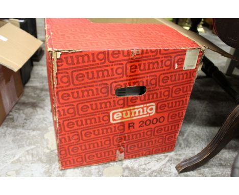 A Eumig projector, boxed.