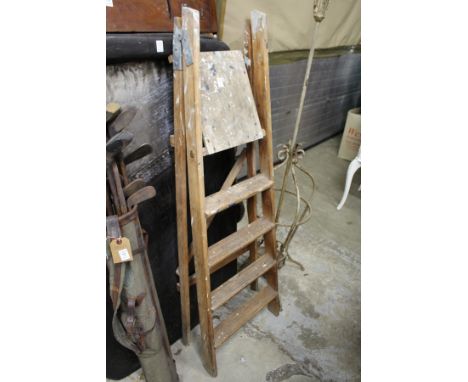 A wooden step ladder.
