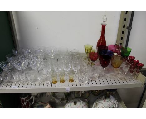 Cut glass champagne glasses, colourful glassware etc.