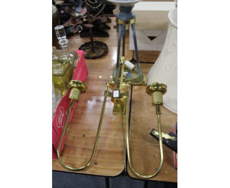 A brass twin branch wall light.