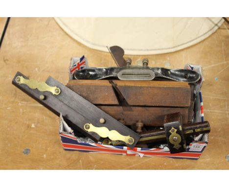 A small box of wood-working tools.