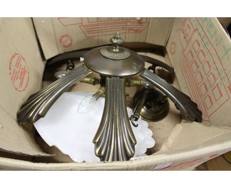 A decorative six light chandelier with alabaster shades.