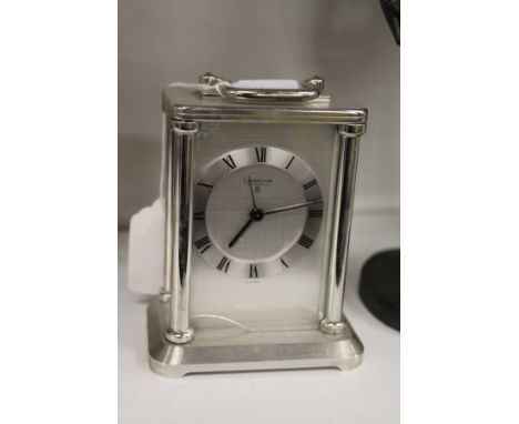A carriage clock (AF).
