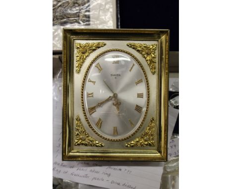 A Swiza mantle clock.